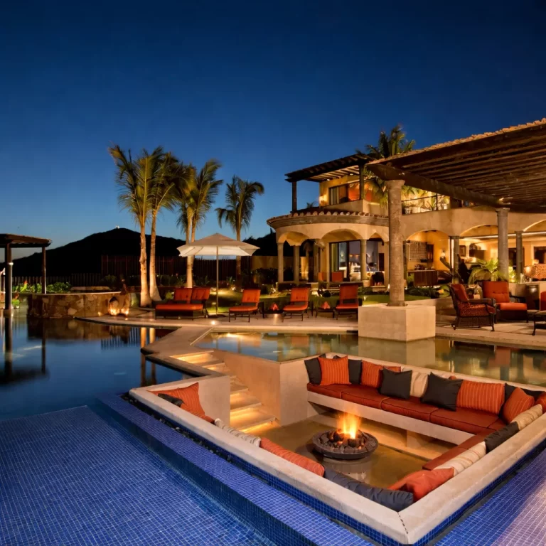 Copala terrace with infinity pool and sunken lounge at dusk